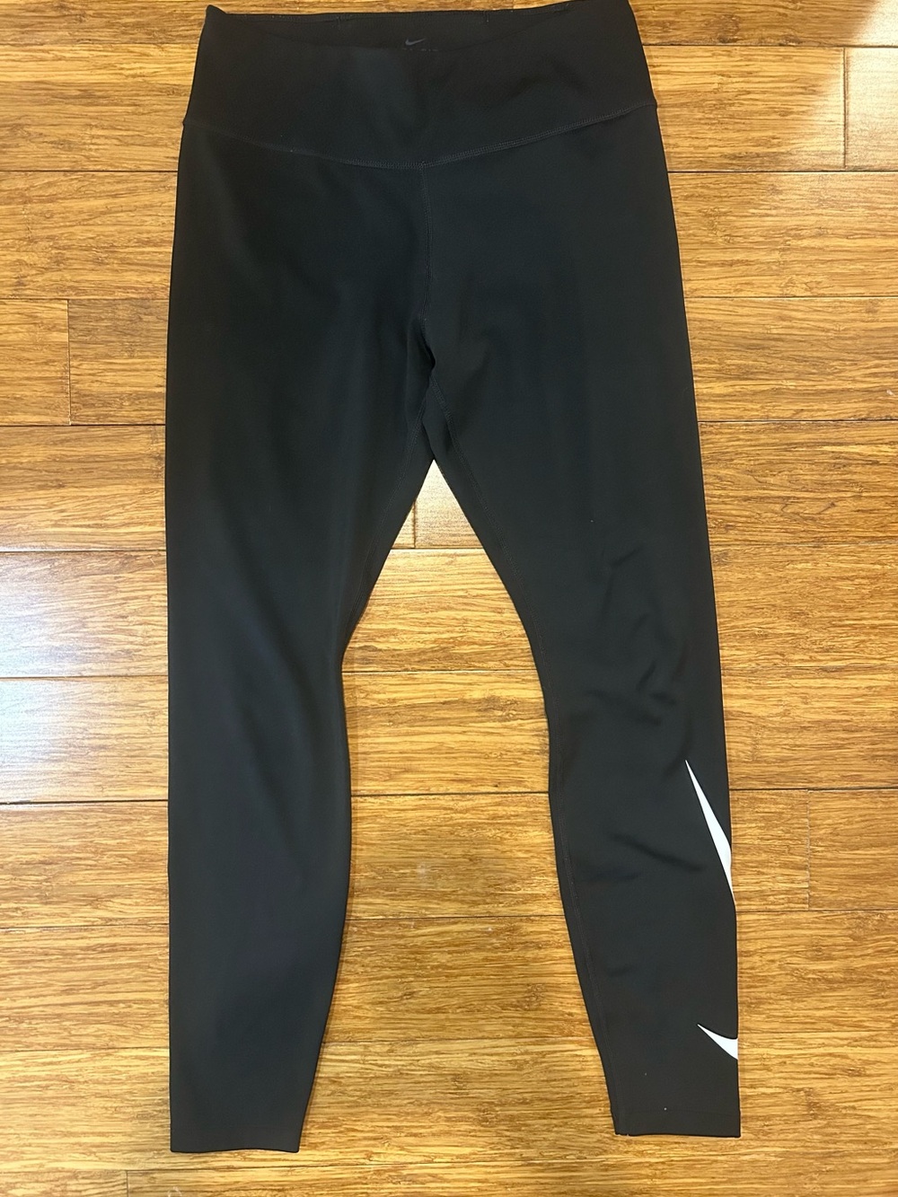 Nike Dri-Fit Black Leggings with White Swoosh Accent
